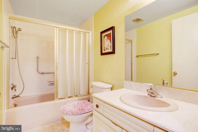 full bathroom with tub / shower combination, tile patterned floors, toilet, and vanity