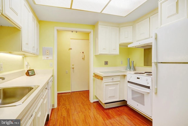 kitchen featuring sink, white cabinetry, white appliances, and light hardwood / wood-style floors