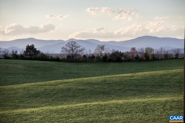 view of mountain feature with a rural view