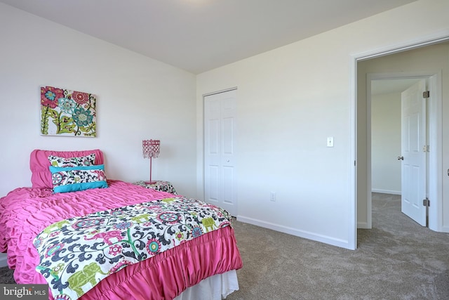 bedroom featuring a closet and carpet