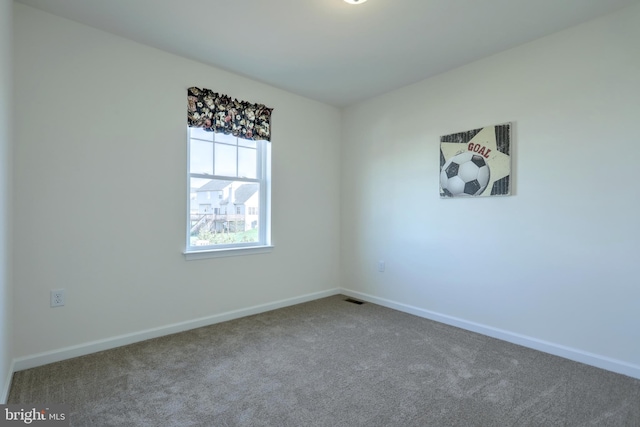 view of carpeted spare room