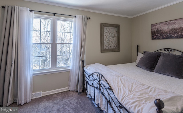 carpeted bedroom featuring ornamental molding