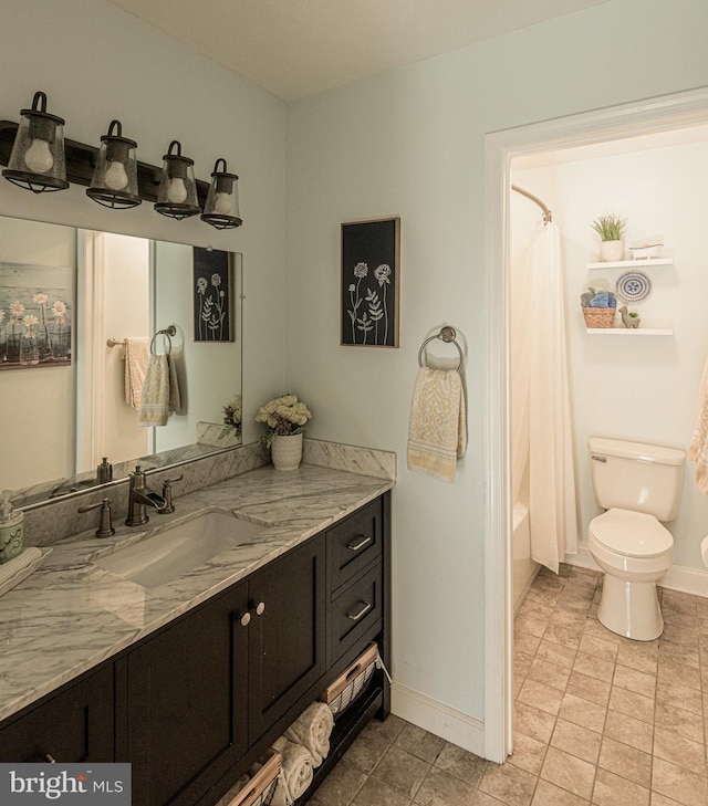 full bathroom featuring shower / tub combo with curtain, vanity, and toilet