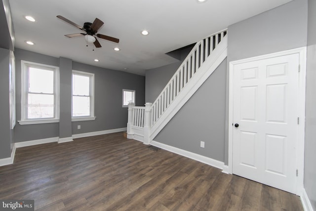 entrance foyer featuring ceiling fan and dark hardwood / wood-style flooring