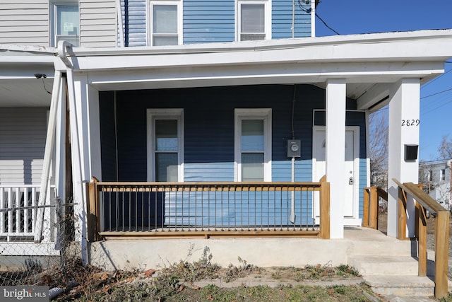 doorway to property with a porch