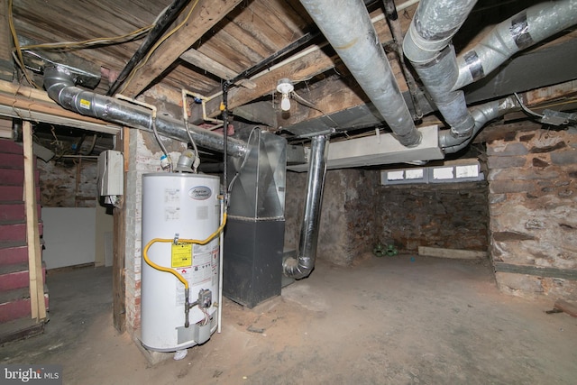 basement with water heater and heating unit