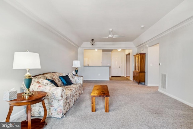 carpeted living room featuring lofted ceiling and ceiling fan