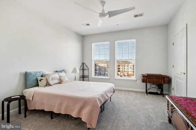 carpeted bedroom featuring ceiling fan