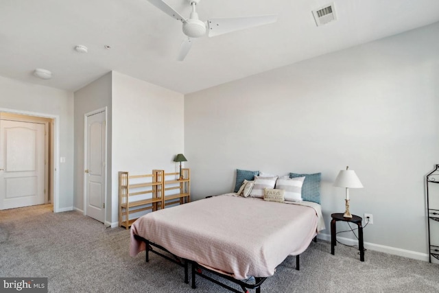 bedroom with ceiling fan and carpet flooring