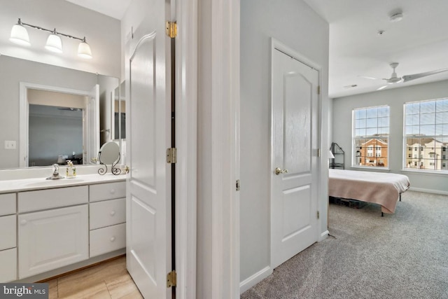 bathroom with vanity and ceiling fan