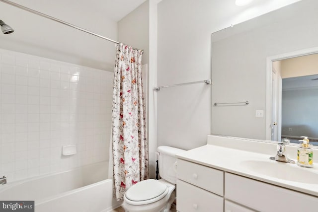 full bathroom with vanity, toilet, and shower / tub combo with curtain