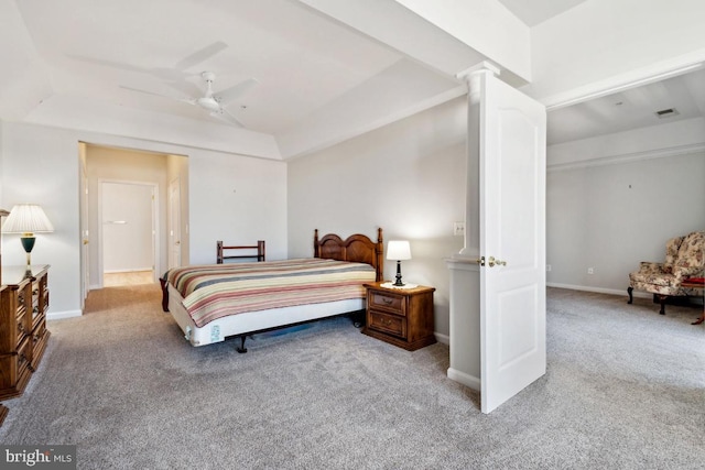 bedroom with ceiling fan and light carpet