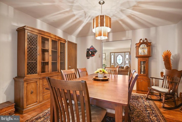 dining space featuring hardwood / wood-style flooring