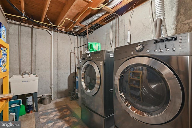 laundry room with washer and dryer