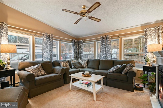 sunroom featuring ceiling fan and vaulted ceiling