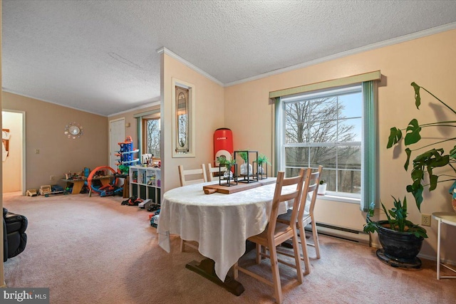 dining space with crown molding, carpet flooring, and plenty of natural light