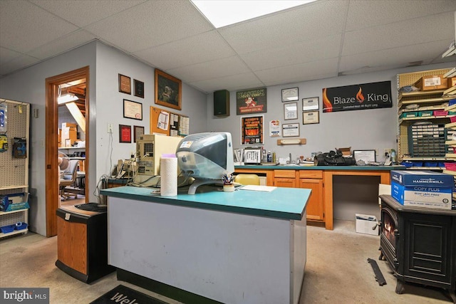 home office featuring a paneled ceiling