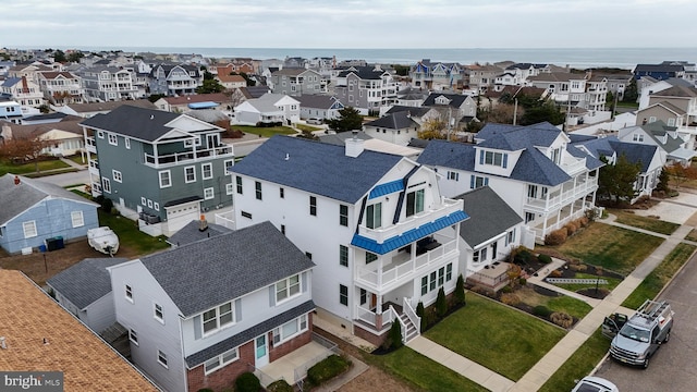 drone / aerial view with a water view