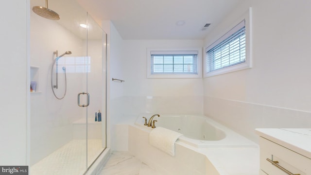 bathroom with independent shower and bath