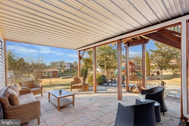 view of patio with a playground and outdoor lounge area