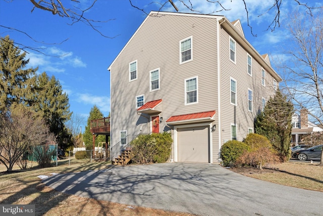 view of home's exterior with a garage