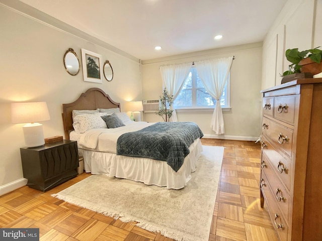 bedroom with light parquet flooring and ornamental molding