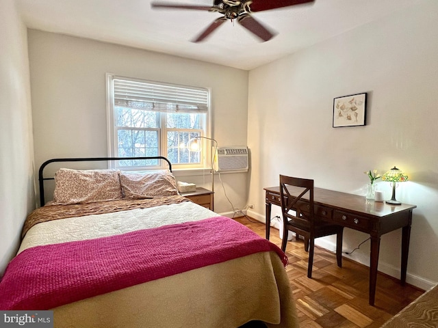 bedroom featuring parquet flooring and ceiling fan