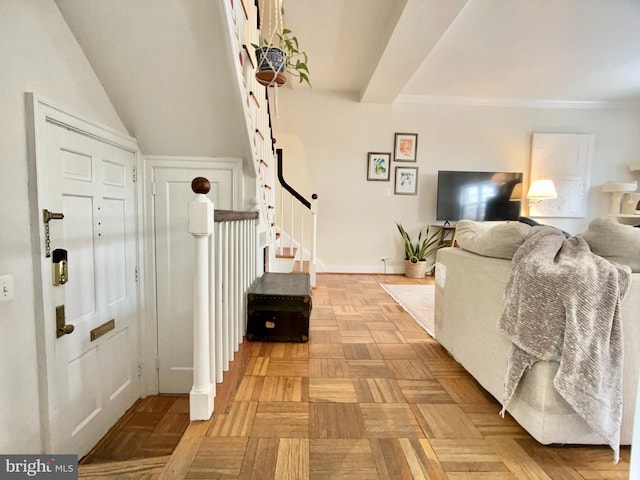 entrance foyer featuring light parquet floors