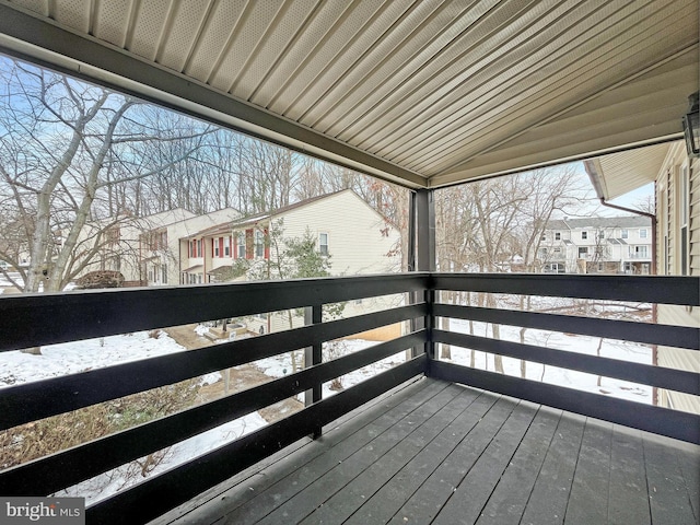 view of snow covered deck