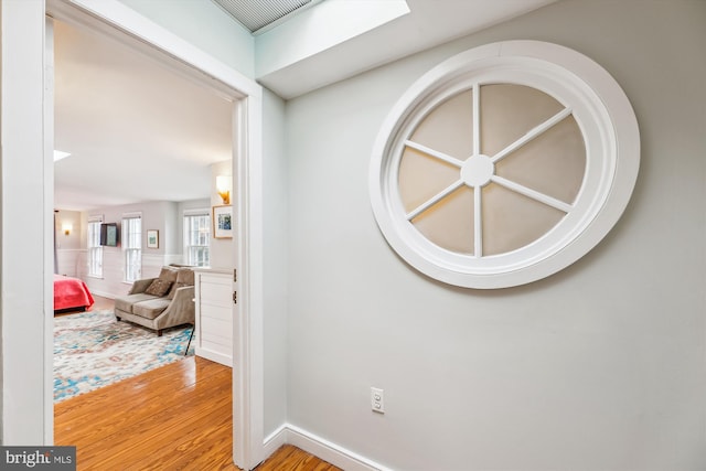 hallway with light wood-type flooring