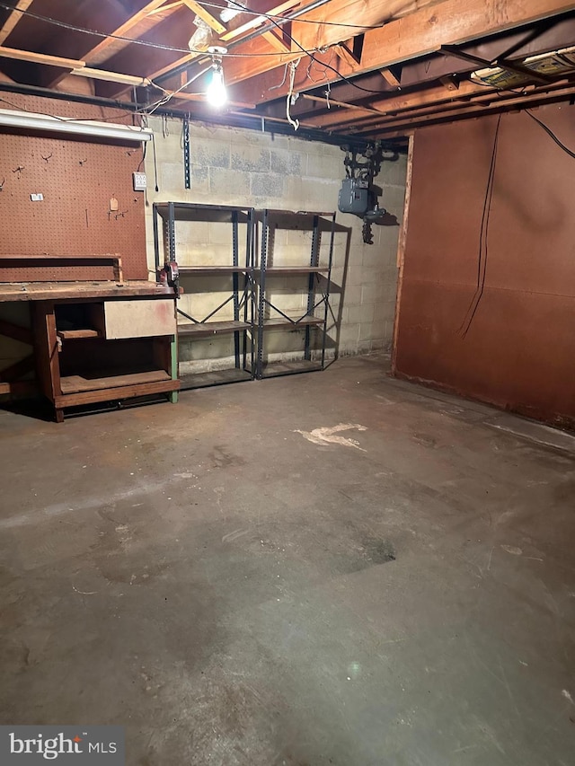 basement with a workshop area