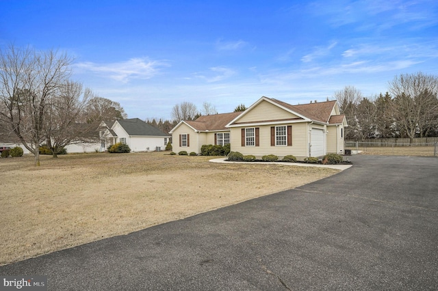 single story home with a garage