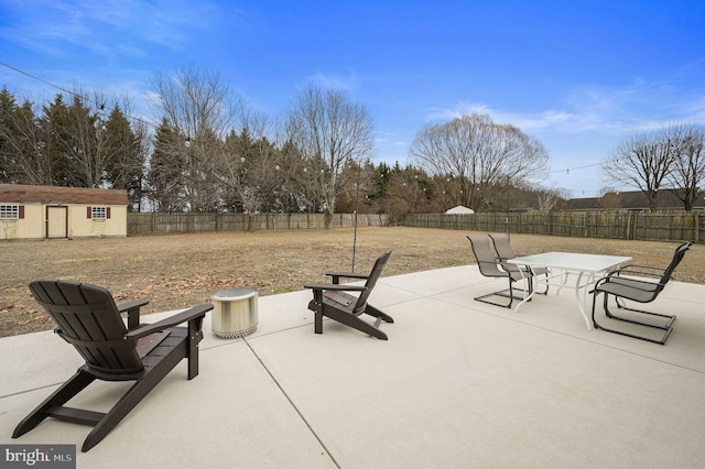 view of patio / terrace featuring a shed