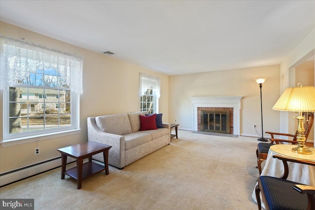 living room featuring a fireplace, light carpet, and a wealth of natural light