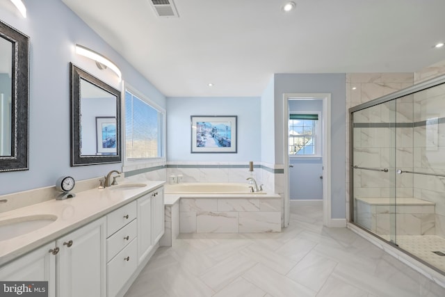 bathroom featuring separate shower and tub, tile patterned floors, and vanity