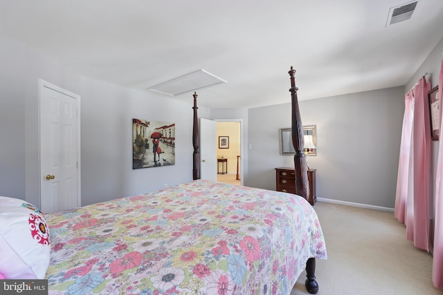 bedroom with light colored carpet