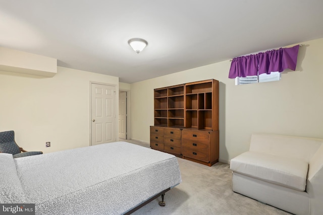 bedroom with light carpet