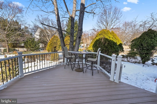 view of snow covered deck