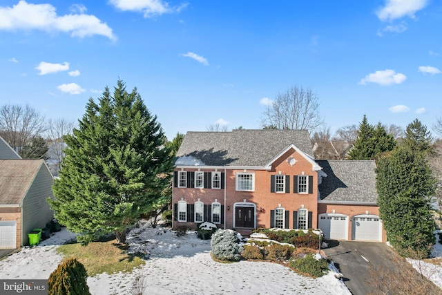 colonial inspired home with a garage