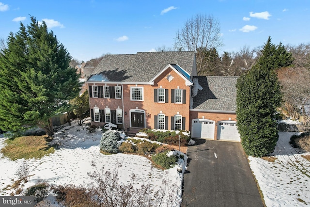 colonial-style house with a garage