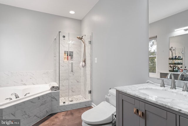 full bathroom with toilet, recessed lighting, a stall shower, a bath, and vanity