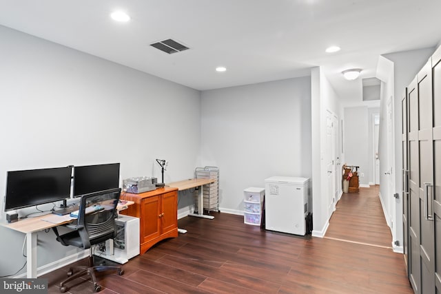 home office with recessed lighting, visible vents, baseboards, and dark wood finished floors