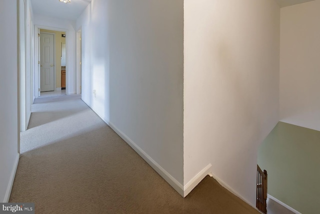 corridor with carpet floors