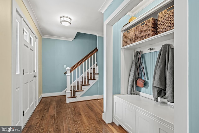 mudroom with crown molding and hardwood / wood-style floors