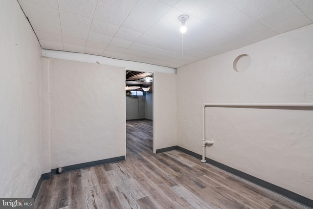 spare room featuring hardwood / wood-style floors