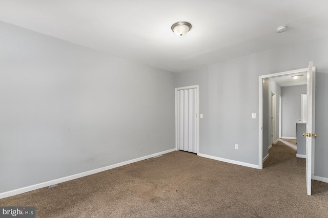 spare room with carpet flooring