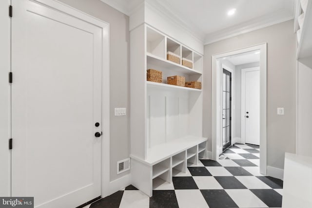 mudroom with crown molding