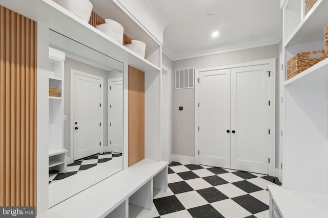 mudroom featuring crown molding