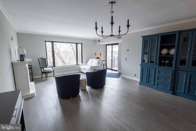 interior space featuring crown molding, dark hardwood / wood-style flooring, and an inviting chandelier