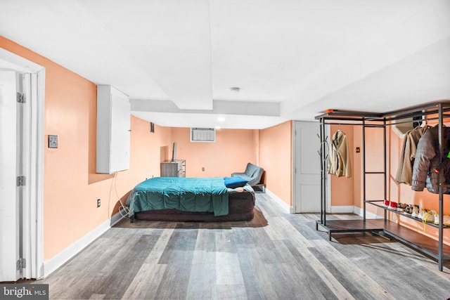 bedroom with billiards and wood-type flooring